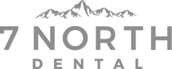 7 North Dental logo featuring mountain peaks and gray text branding