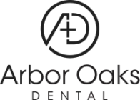 Arbor Oaks Dental logo featuring stylized tooth design in circular emblem
